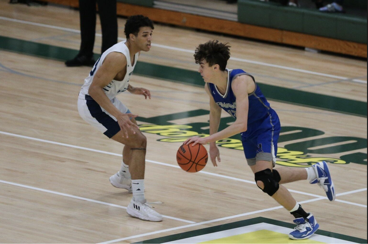 Boys Basketball Tips Centennial, Advances to Region Semi